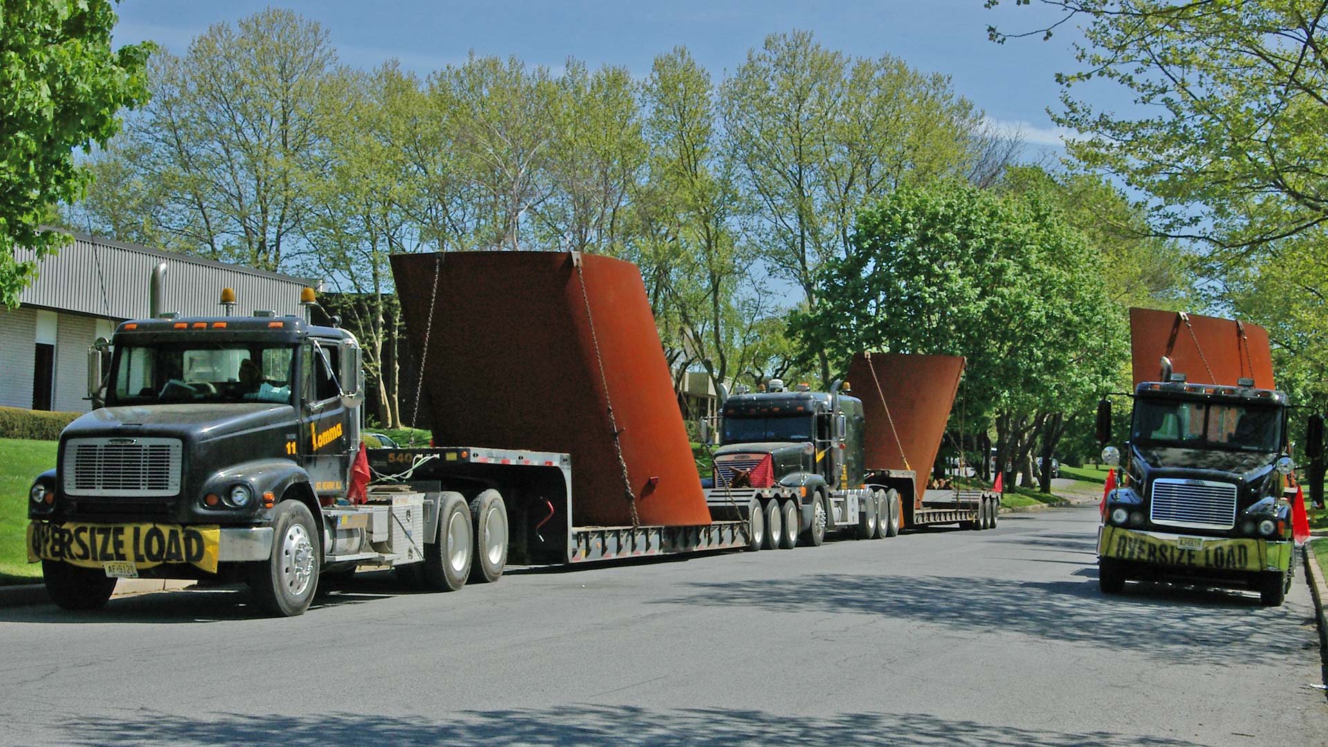 Richard Serra's Titled Arc sculpture on flatbed trucks