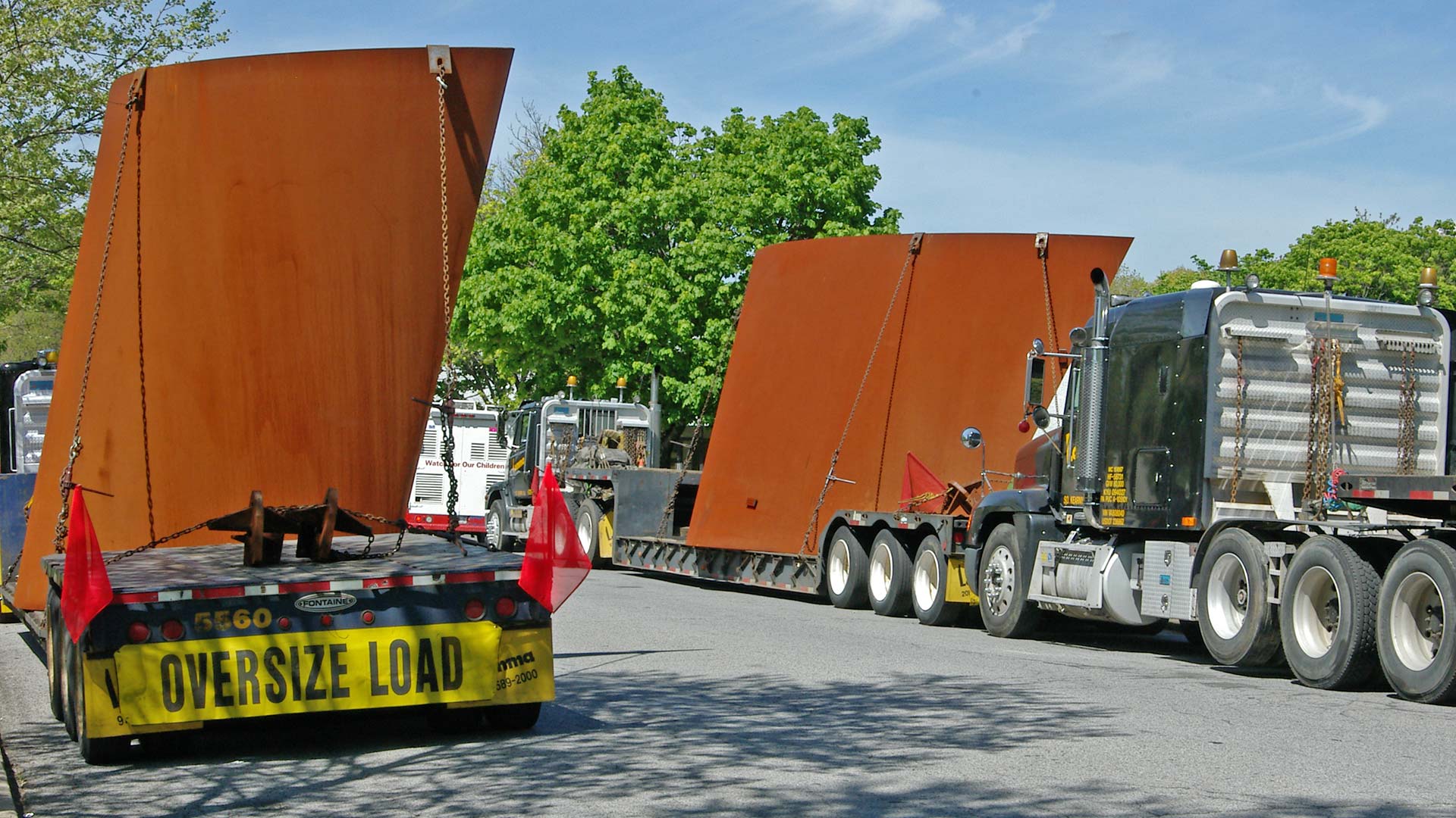 Richard Serra's Tilted Arc sculpture on flatbed trucks
