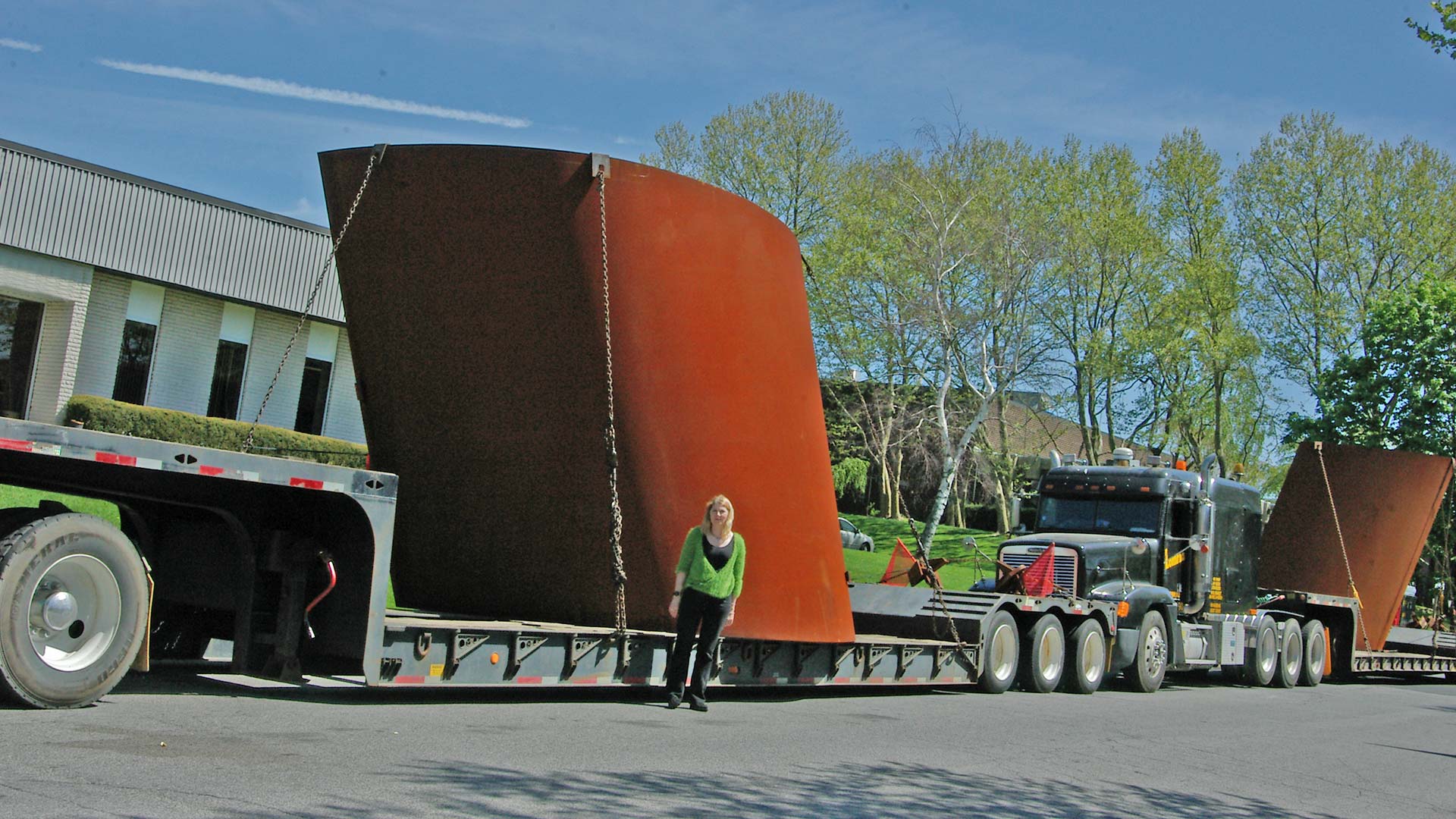 Richard Serra's Tilted Arc sculpture on flatbed trucks